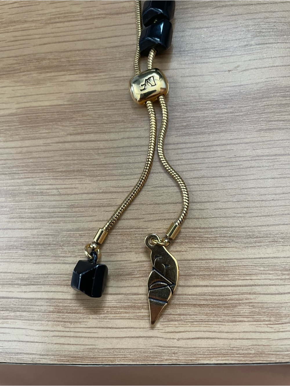 Diane von Furstenberg gold plated adjustable cube necklace
